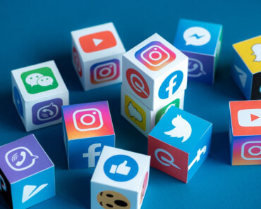 image of blocks with social media platform logos on all sides - How to Become a Social Media Marketing Star in Simple Steps