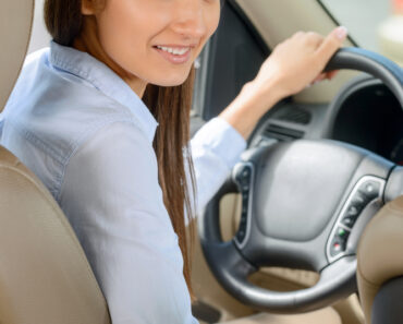 Young woman practicing driving - How do I practice my G1 test in Ontario
