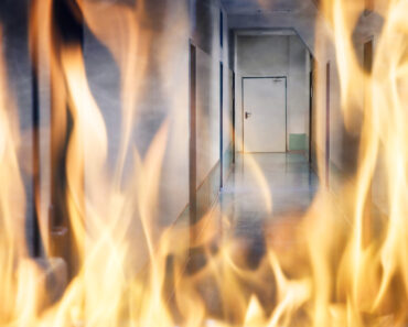 Close-up Of Fire Burning On The Corridor Of The Building - Protecting Your Business Investments